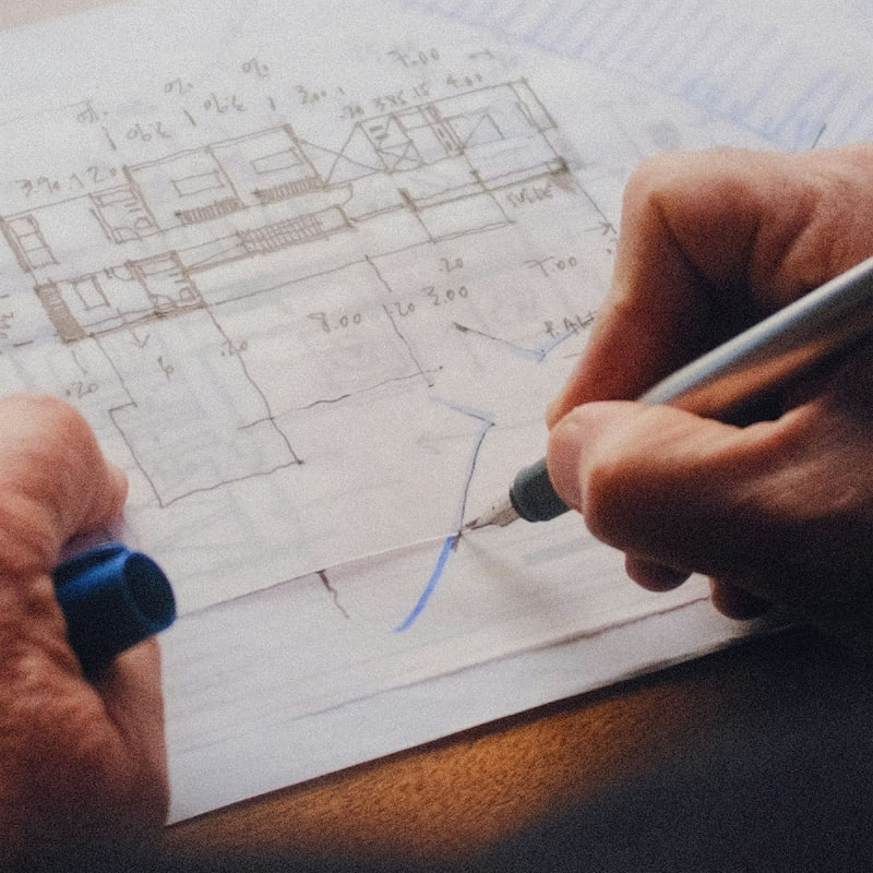 Architect drawing house plans