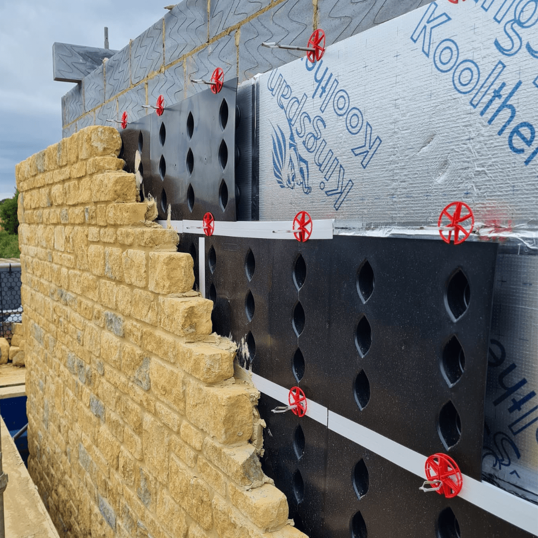 Masonry construction, against the SureCav BBA approved, cavity spacer, rainscreen system used with a partial fill insulation cavity.