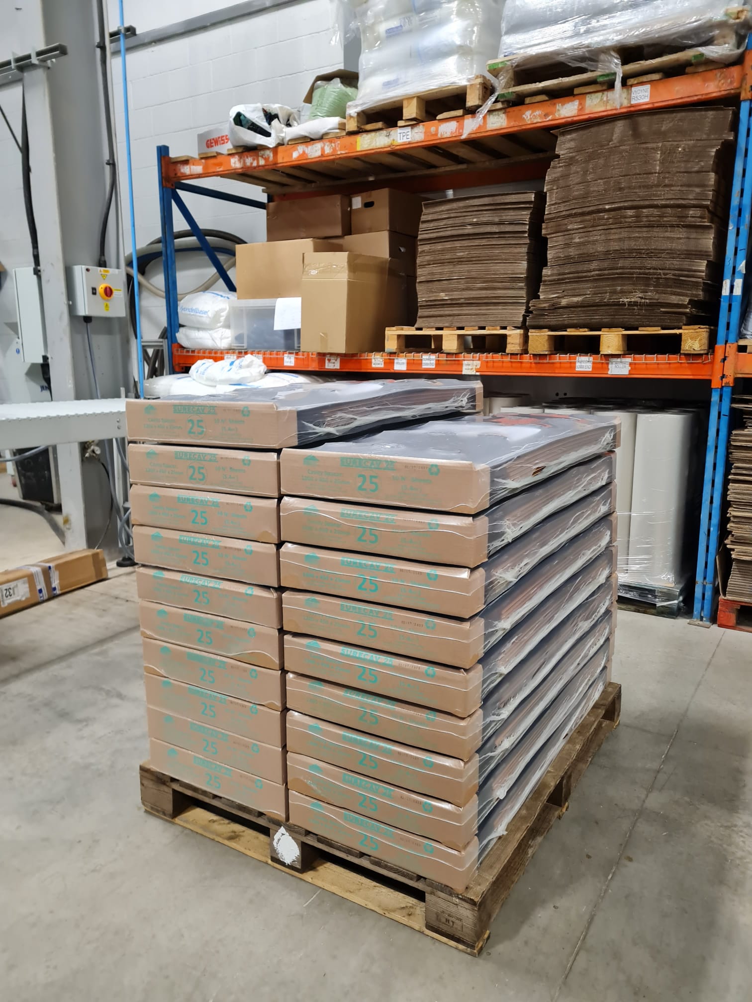 Image of the SureCav sheets stored neatly on a pallet. 1 pallet covers 108m2, 200no sheets