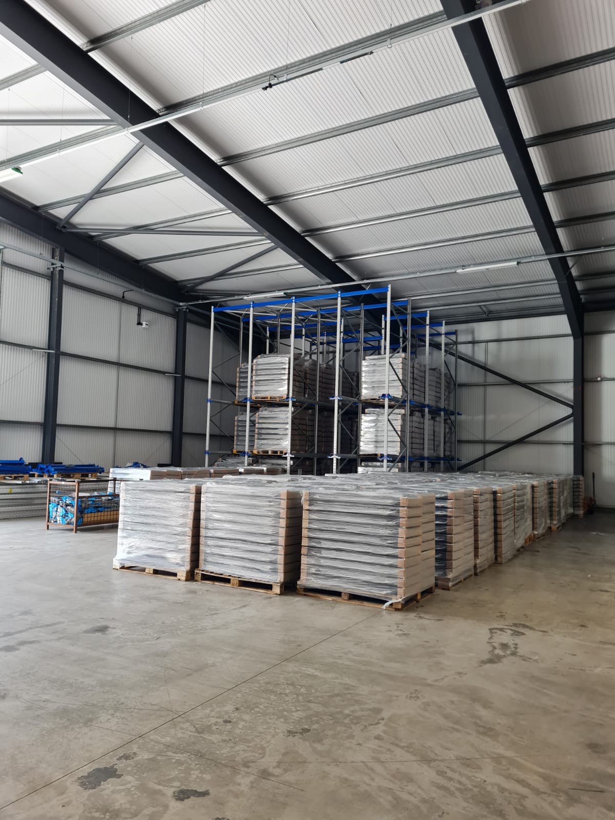 SureCav stored on pallets, used with Masonry construction, against the SureCav BBA approved, cavity spacer, rainscreen system used with a partial fill insulation cavity.